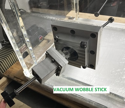 Wobble stick and manual manipulation of vacuum chamber interior